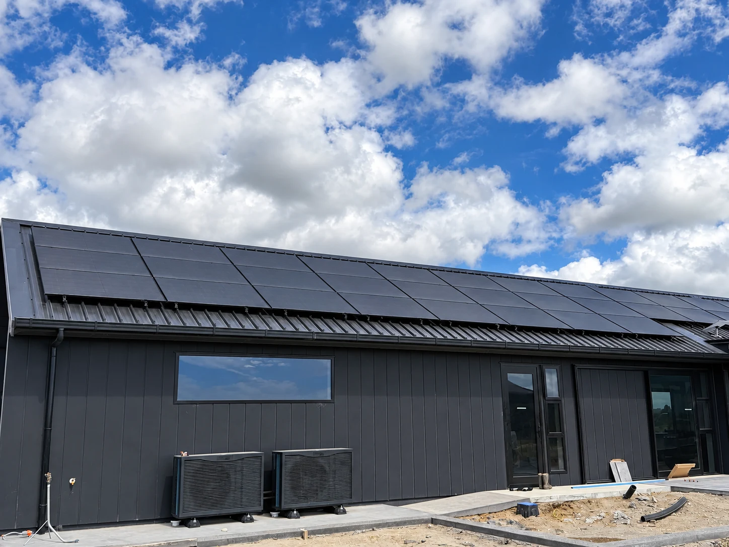 Rooftop solar panels on a Taranaki home